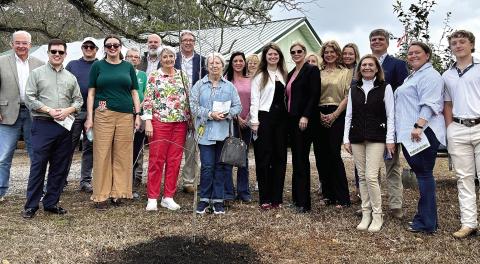 Joyce Conn is remembered with the Feb. 20 planting of a Redbud Tree as part of the celebration of Arbor Day. DEBBIE LURIE-SMITH/Staff