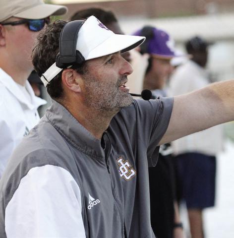 Defensive coordinator Will Conner directs the Greyhounds defense during the spring game earlier this month. BRAD HARRISON/Staff