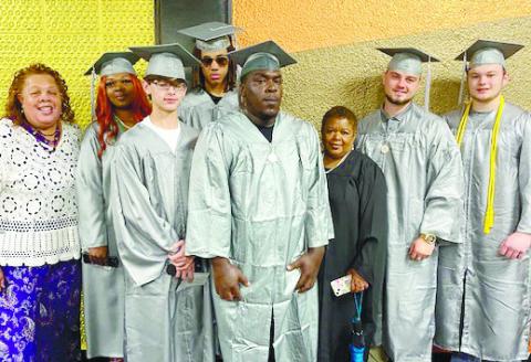 Jones County Adult Education graduates participated in the Central Georgia Technical College graduation on Friday, May 5. Faye Miller is the Adult Education Instructor, and Joanne Greene is her administrative assistant. CONTRIBUTED