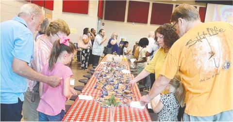 Students and grandparents at Gray Elementary grab breakfast at Gray Elementary’s annual Grandparents Day Breakfast.