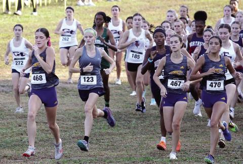 Competing against teams mostly from the Atlanta area, four Lady Greyhounds set season-best times at Saturday’s Coach Wood Invitational in Whitesburg. BRAD HARRISON/Staff