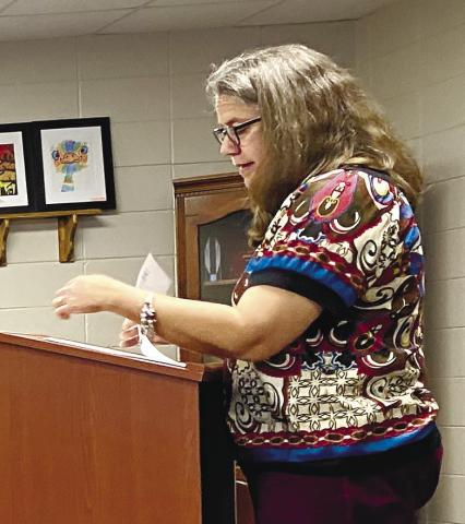 Family Engagement Director Leslie Poythress speaks to the board during the Title I presentation. DEBBIE LURIE-SMITH/Staff