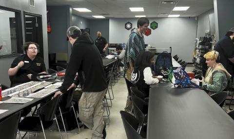 Tables and chairs are set up in the room to give customers plenty of space to play the various tabletop games, such as Magic the Gathering, that can be found at Mop Top &amp; Beardie.