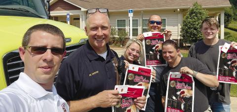 GFD Chief Keith Eisele and members of the Gray Fire Department prepare to knock on doors at Water Tower Park. CONTRIBUTED