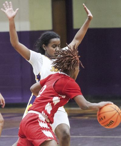 The Lady Hounds zeroed in defensively against Woodland, holding the Wolfpack to one field goal in the third quarter. BRAD HARRISON/Staff