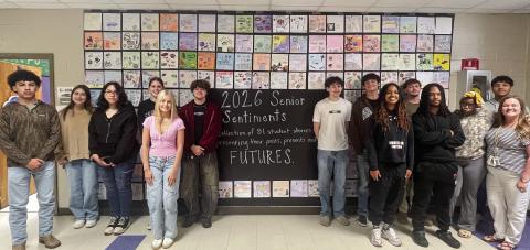 JCHS English teacher Crystal Burt (far right) and her senior student class in front of one of their final assignments. CONTRIBUTED