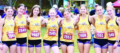 The Lady Hounds continued their forward progression at Saturday’s Coach Wood Invitational, placing third in the varsity race. CONTRIBUTED
