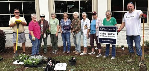 Members of Woodmen of the World and Gray Garden Club met April 30 to plant red, white and blue flowers at Jones County Public Library. They installed the garden to celebrate the 250th birthday of our nation. Woodmen provided a grant for the materials, and both clubs provided labor.
