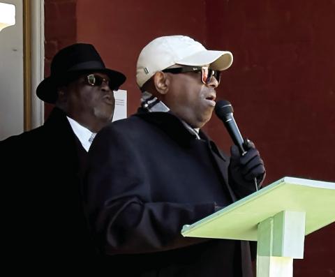 Rev. Wilbur Greene speaks at MLK Jr. March last week with Rev. Greg Lofton next up. DEBBIE LURIE-SMITH/Staff