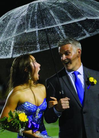 JCHS senior Isabella Bodnarchuk shows her surprise at being named the 2026 Homecoming Queen with her dad, Michael Bodnarchuk. SEE HOMECOMING COURT >> PAGE B1 SEE HOMECOMING GAME COVERAGE >> PAGE C1 BRAD HARRISON/Staff