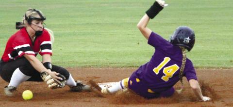 Kimber Kent’s _rst-inning stolen base on Thursday led to an early run against Dodge County. BRAD HARRISON/Staff
