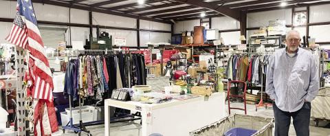 Hinson in the huge warehouse full of merchandise. GREENBERRY MOORE/Staff
