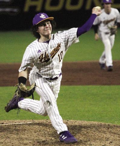 Carter Harris fires a pitch toward the plate on Friday against Mary Persons. BRAD HARRISON/Staff