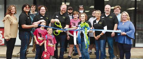 Mop Top &amp; Beardie doing their ribbon cutting ceremony with the Chamber of Commerce on April 9.