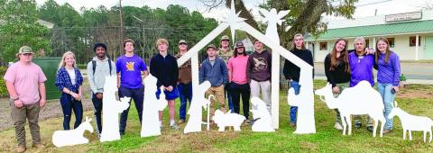 Students in Nick DiPalo’s construction class at Jones County High School created, delivered and set up this nativity for the Jones County Library last week. Branch Manager Julie King said classes were asked to bring decorated trees, and the construction class asked if they could bring the nativity instead. Contributed