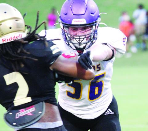 Greyhounds offensive tackle Luke McCoy picks up the block against Mary Persons, allowing Jones County to gain offensive yards. BRAD HARRISON/Staff