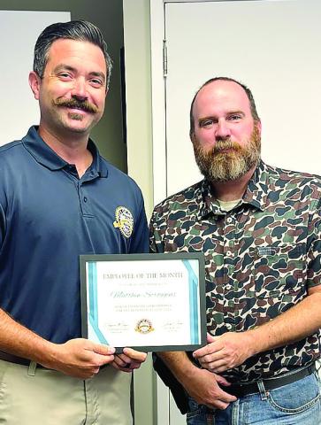 Matthew Scroggins (left) receives the City of Gray’s first Employee of the Month certificate from Mayor Pro Tem James Collins. CONTRIBUTED