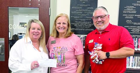 Exchange Bank makes library donation