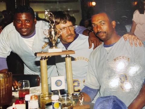Assistants (l-r) Glenn Daniels and Danny Rogers with Patterson behind the 1989 state championship trophy. CONTRIBUTED
