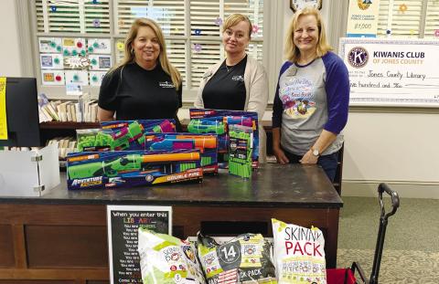 Exchange Bank has partnered with the Jones County Library to help with programming. They brought nerf guns for the teen program and snacks for the kids book to movie club. Pictured are (l-r): Barbara Merritt, Tracey Lowe and Julie King. CONTRIBUTED