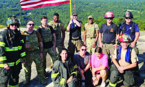 Four members of the Jones County Fire Department were joined by four members of the Gray Fire Department for the climb up Stone Mountain in honor of those who lost their lives 9/11/2001. DEBBIE LURIE-SMITH/Staff