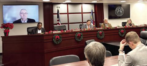 The Georgia Public Service Commission, with member Tim Echols attending remotely, voted Friday, Dec. 19, 2025 to let Georgia Power add nearly 10 gigawatts of capacity, a massive expansion that will cost billions of dollars. TY TAGAMI/Capitol Beat