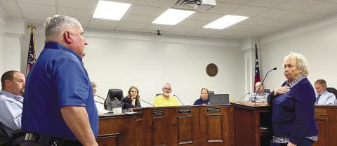 Jones County Emergency Management Director Don Graham listens to the concerns of Ruby Potts at the May 2 Board of Commissioners Meeting. DEBBIE LURIESMITH/Staff