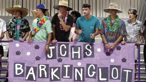 The Volleyball version of the JCHS Barking Lot cheers on the Lady Greyhounds from above during last Thursday’s match. BRAD HARRISON/Staff
