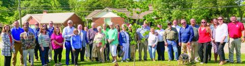 Jones County celebrated Arbor Day April 26 with the planting of an Eastern Redbud tree in memory of former school superintendent Linton Jordan. DEBBIE LURIE-SMITH/Staff