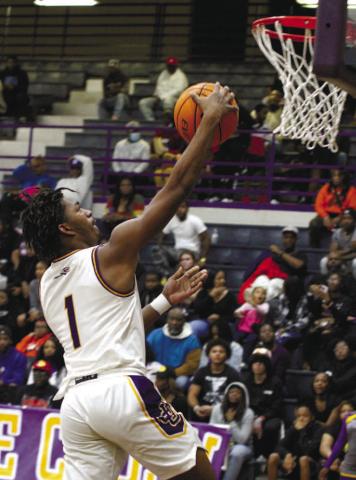 Greyhounds guard Zacari Thomas glides in for a layup against Northeast. BRAD HARRISON/Staff