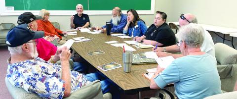 Veterans Committee members discuss the Nov. 9 plans at last week’s meeting. DEBBIE LURIE-SMITH/Staff