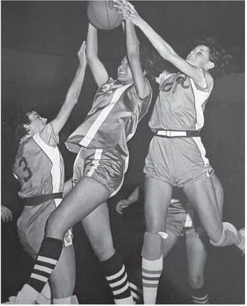 Malone (right) fights for ball in a Jones County High School game, where she still holds records for prolific scoring. CONTRIBUTED