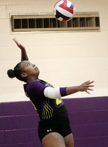Zakeena Sturgeon serves the ball into play against the Hurricanes. BRAD HARRISON/Staff