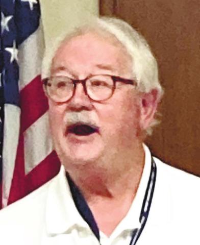 Ken Vance, in his role as safety director for the Putnam County Charter School System, speaks officers in schools July 18 during preparation for an active shooter scenario. LYNN HOBBS/Staff