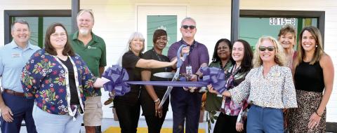 Treevana Powered by Sanctuary staff and the Milledgeville-Baldwin Chamber of Commerce cut the ribbon Sept. 9 to officially open the first medical cannabis facility in Milledgeville. BAILEY BALLARD/Staff