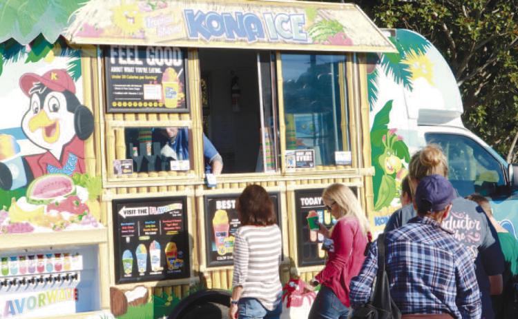 Food trucks were located in various places throughout the event in downtown Gray. NATHAN CLARKE/Staff