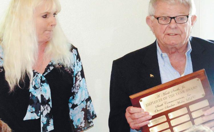 Smith Communications Business Manager Cassandra Fowler is announced as the 2022 Employee of the Year by President and CEO A. Mark Smith Sr. IAN TOCHER/Staff