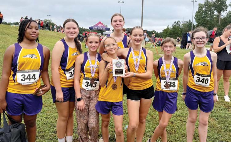 Middle school runners collect more hardware