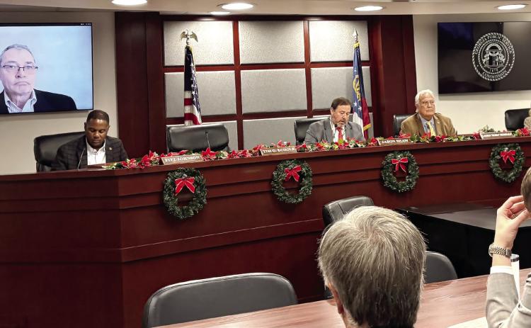 The Georgia Public Service Commission, with member Tim Echols attending remotely, voted Friday, Dec. 19, 2025 to let Georgia Power add nearly 10 gigawatts of capacity, a massive expansion that will cost billions of dollars. TY TAGAMI/Capitol Beat